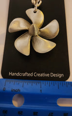 Llavero de peltre con hélice de barco