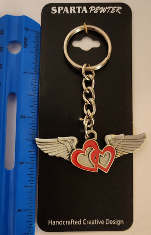 Llavero de peltre con alas en 3D y corazón delineado en rojo