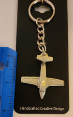 Llavero de peltre con forma de avión Canadair CL-41 Tutor (Snowbirds)