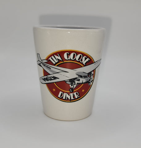 Vaso de chupito de cerámica con logotipo redondo de avión trimotor Tin Goose Diner