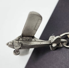 Llavero de avión de peltre de Aeronca