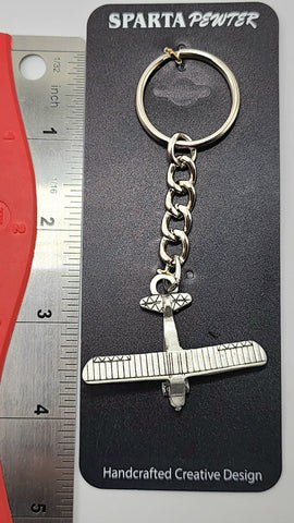 Llavero de avión de peltre de Aeronca