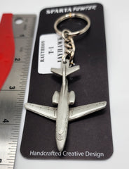 Llavero de peltre con forma de avión Raytheon T-1 Jayhawk