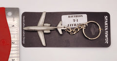 Llavero de peltre con forma de avión Raytheon T-1 Jayhawk