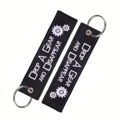 Llavero bordado "Suelta un engranaje y desaparece"