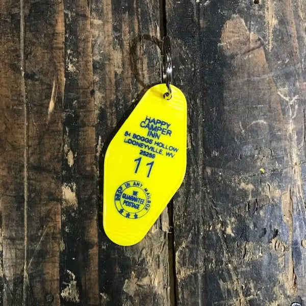 Llavero con llavero del motel Happy Camper Inn 