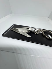 Llavero de peltre con el avión furtivo Lockheed F-117 Nighthawk