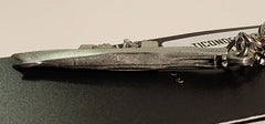 Llavero de peltre del crucero clase Ticonderoga