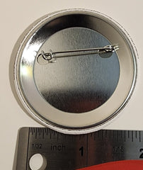 Pin con el mensaje "Ayudé a salvar al ganso de hojalata"