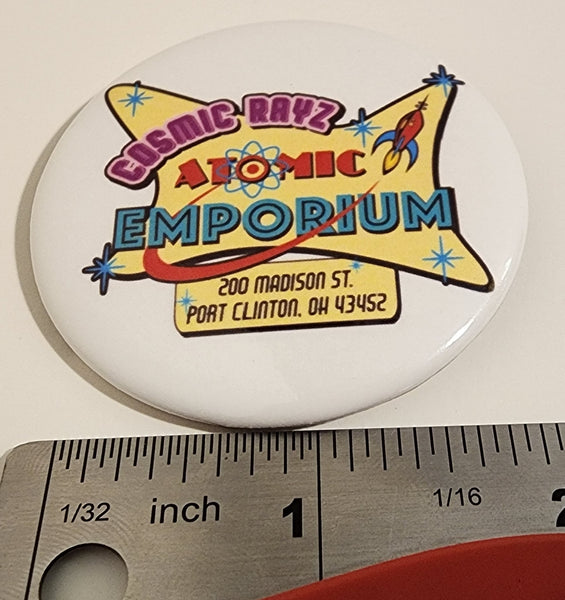 Pin de botón del Emporio Atómico Cosmic Rayz