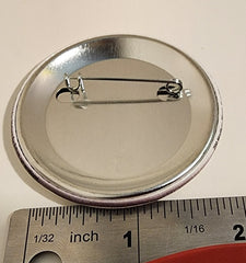 Pin de botón del Emporio Atómico Cosmic Rayz