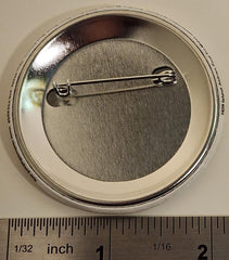 Pin de botón redondo con el trimotor de la marca Fly the Ford