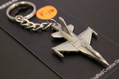 Llavero de peltre con el avión de combate F-16 de General Dynamics