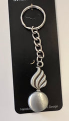 Llavero de peltre con el logotipo de artillería del ejército