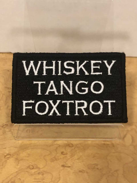 Parche de velcro con la inscripción "WTF" (letras blancas) de Whiskey Tango Foxtrot