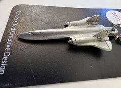 Llavero de peltre con el avión Lockheed SR-71 Blackbird