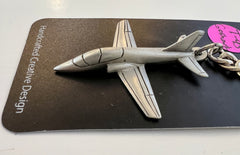 Llavero de peltre con forma de avión McDonnell Douglas T-45 Goshawk